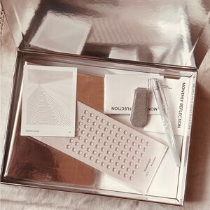 Silver bling box of planner supplies